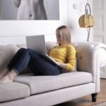 girl-on-laptop-relaxed-sofa